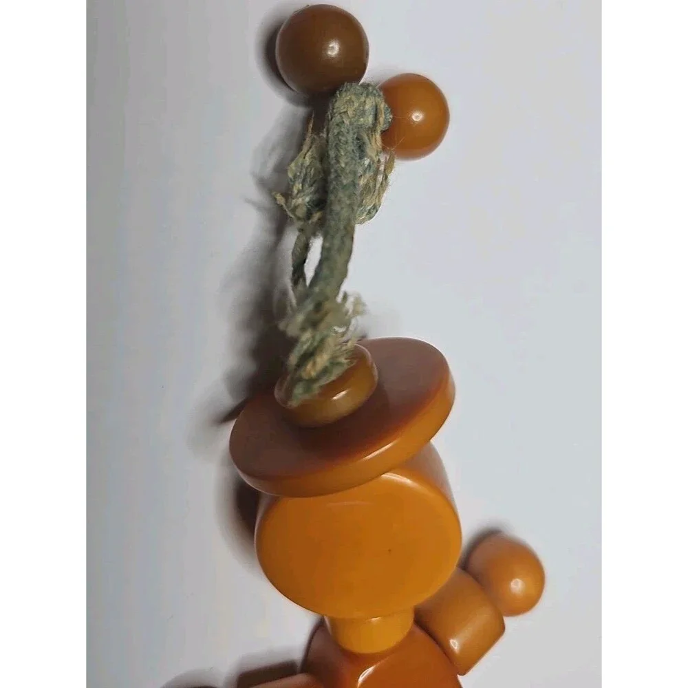 Vintage Bakelite Tykie Toy Crib Toy Yellow Orange Green
